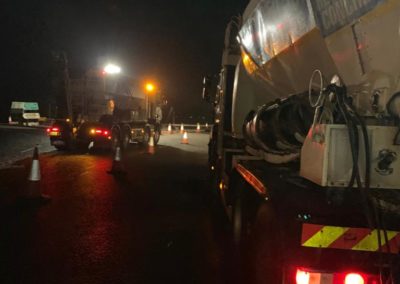 A Gills Mix Concrete mixer undertaking a night time concrete delivery for National Highways